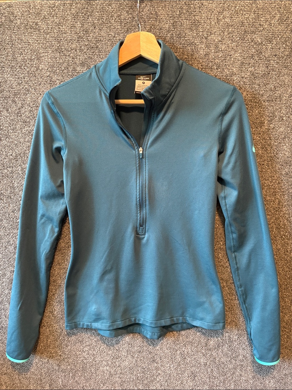 Women’s Nike Teal Quarter-Zip DriFit Pullover
Size: Small